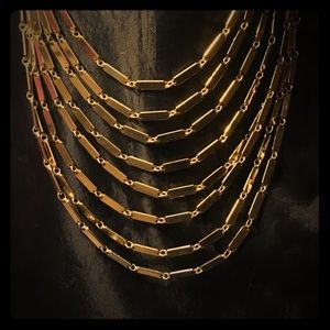 Heavy gold toned multi-layer chain